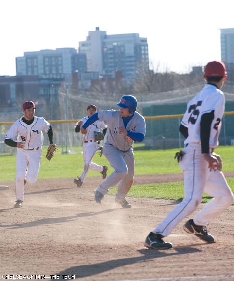 Bryan A. Macomber ’12 (left) and Kenneth M. Lin ’12 of the MIT baseball team catch US Coast Guard Academy’s Brian Yurovich in a rundown between the second and third bases, ultimately tagging him out in the second game of Monday’s double-header on Brigg’s Field. The Engineers won both games with scores of 18-1 and 7-4, respectively.