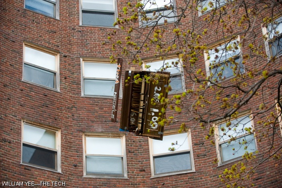 A piano is seen falling from the roof of Baker House on Thursday, April 23 during Piano Drop. Piano Drop is hosted by Baker every year to commemorate Drop Date.