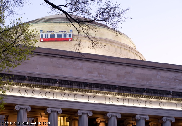 Hackers installed a solar-powered Boston MBTA-style subway car riding on the wall around MIT’s Great Dome on Monday, April 27, visible from Killian Court. The train’s next stop is listed as “Baker House,” referring to a hackers’ tradition of asking, “Is this the way to Baker House?” when discovered in strange or illicit locations by officers of the MIT Police.