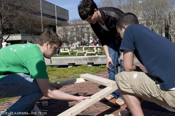 (left to right) David B. Kelley ’10, Patrick H. Yamane ’11, and Isaac C. Joseph ’11 build picnic tables for Habitat for Humanity of Greater Lowell during Campus Build on Friday, April 24.