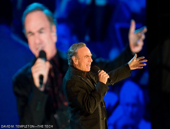 Singer Neil Diamond sings his signature song “Sweet Caroline” to large crowd packed on the Esplanade during the rehearsal of CBS’s national broadcast of the Boston Pops Fireworks Spectacular on July 3.