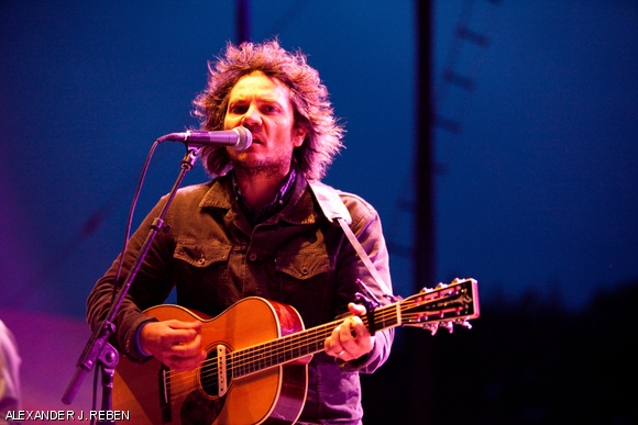 Jeff Tweedy, the lead singer of Wilco, performs in Lowell, MA on July 11. Though the weather turned sour, it only made the sounds sweeter.