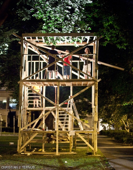 Students work late on Sunday evening to finish a multiple-storey wooden tower in the East Campus courtyard. Traditionally, East Campus builds a variety of projects for Residence Exploration, which have in the past included a roller coaster, a water slide, and a giant pendulum.