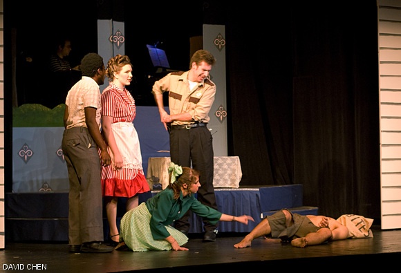 Shelley Parker (Karen A. Hart ’11) makes first contact with Bat Boy (Steven L. Camina G) after he is brought in by Sheriff Reynolds (Edmund Golaski ’99) during MTG’s rendition of Bat Boy: The Musical on Thursday in Little Kresge.