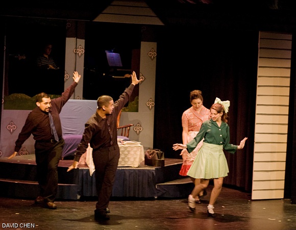 The Parkers — Gregory Lohman PhD ’07 (back left), Kerry Brooke Steere (back right), and Karen A. Hart ’11 (front right) — teach Bat Boy (Steven L. Camina G) the ways of civilization in MTG’s rendition of Bat Boy: The Musical on Thursday in Little Kresge.
