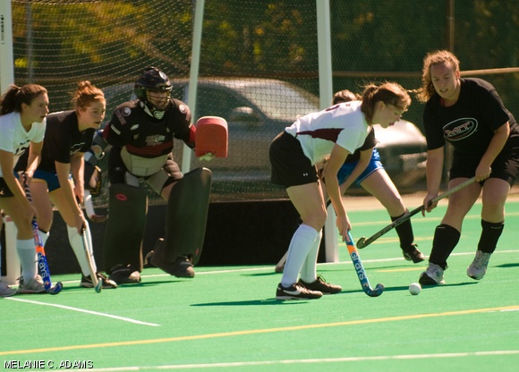 Current members of the Varsity Field Hockey team (white) win against their predecessors 5-0 at the Alumnae Game held on the Barry Astroturf Field on Saturday.