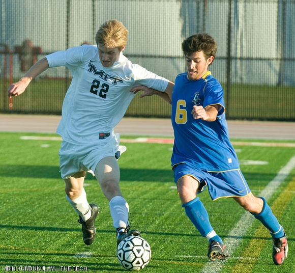 Thomas W. Fronk ’13 fights an Emmanuel College player for possession of the ball on Sept. 21. The Engineers won 9-2.