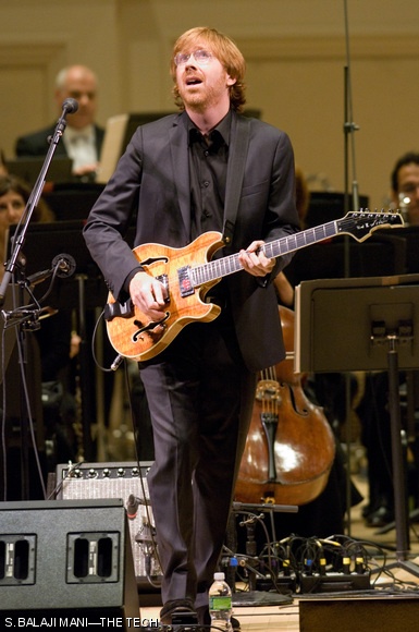 EPIC PROPORTIONS—Trey Anastasio performs “Time Turns Elastic” with the New York Philharmonic. The multi-part work was co-written by Don Hart.