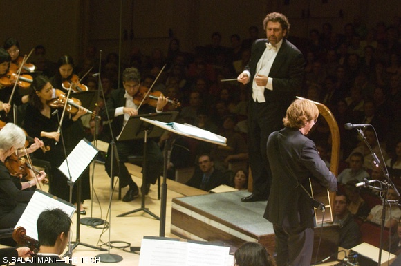 FISCH ON PHISH—Conductor Asher Fisch checks in with Anastasio during “Water In The Sky.”