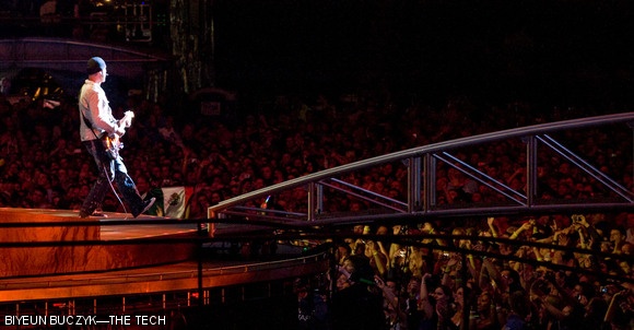 U2 guitarist The Edge stomps his foot to the beat of “Sunday Bloody Sunday” during Sunday’s concert at Gillette Stadium in Foxboro, MA. U2 played two nights there to sold-out crowds. The North American leg of their 360° Tour kicked off on Sept. 12 in Chicago.