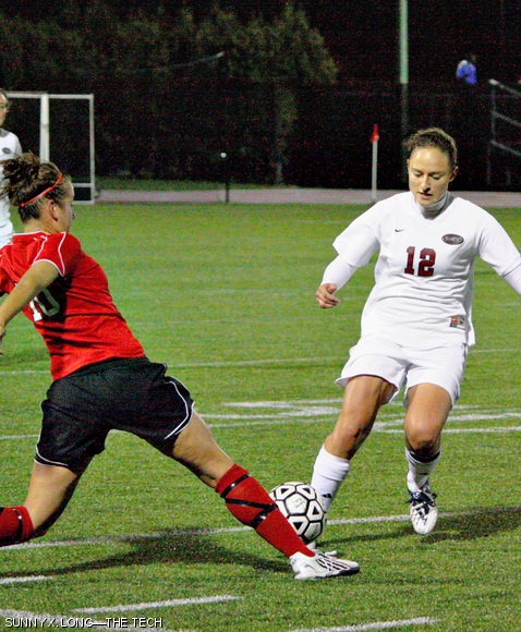 Alisha D. Lussiez ’12 dribbles around a sliding Bridgewater State College defender during the Engineers’ 1-2 loss Wednesday night to the Bears.