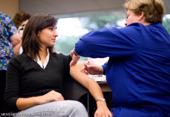 Ece Gulsen G receives an influenza vaccine at MIT Medical’s student-only flu clinic in the Student Center on Thursday. All 1000 doses reserved for the day were used.
