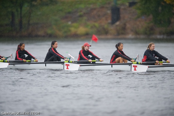 Members of MIT Crew approach the starting line at the Head of the Charles Sunday during the Women’s Lightweight Eight event. The two-day rowing competition is one of the sport’s most celebrated.