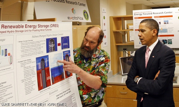 Professor Alexander H. Slocum ’82 presents his research on energy storage to United States President Barack Obama. Slocum explains a system for harnessing excess wind energy. When the wind is not blowing, water flowing into the storage area through a turbine produces electricity. When the wind is blowing, excess power is used to pump water out of the storage area.