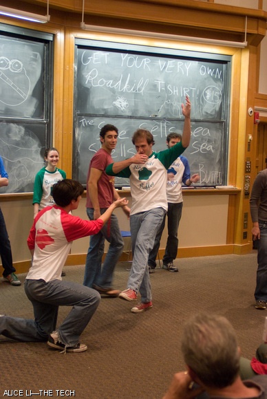 Audience members place Brian T. Basham ’12 (left, kneeling) and Ryan H. Foote ’11 (right) into impromptu poses during Roadkill Buffet’s “The She Sells Sea Shells by the Sea Show” last Saturday.