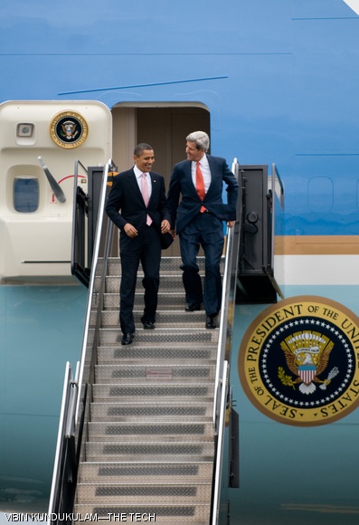 President Obama chats amicably with Massachusetts Senator John Kerry as they both step out of Air Force One. The President’s private aircraft touched down at Logan airport at about 11:30 a.m. on Friday.
