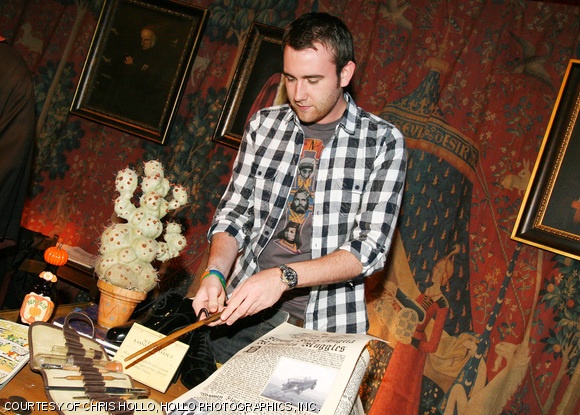Harry Potter star Matthew Lewis (Neville Longbottom) adds his character’s wand to Harry Potter: The Exhibition during the East Coast premiere at the Museum of Science in Boston.