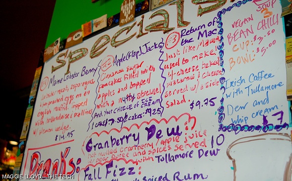 The Friendly Toast promotes its specials on a whiteboard last Sunday around lunch time. Customers praise the diner for the quality of its big pancakes and coffee.