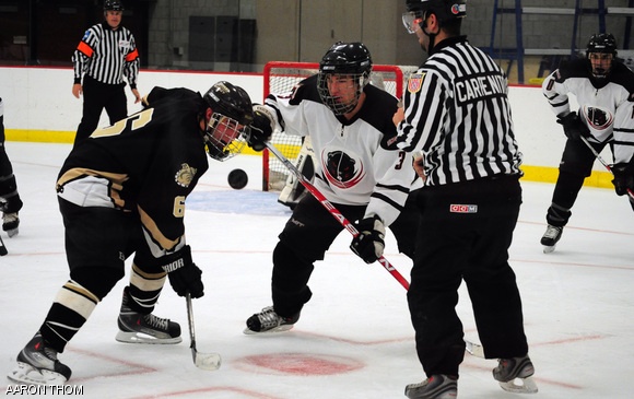 Gabriel V. Blanchet ’13 faces off against John May of Bryant University in Saturday’s ice hockey game. Even though Blanchet scored two goals, the Engineers lost 8-7 against their conference rival.