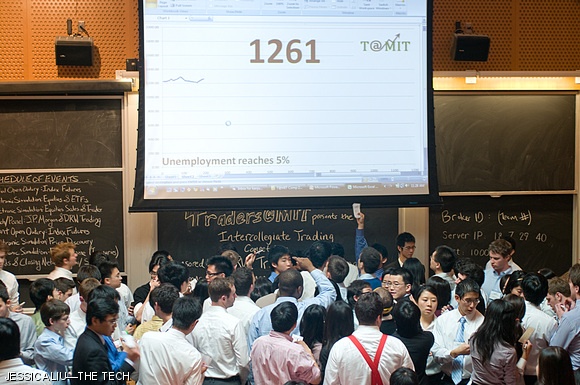 Students simulate a Wall Street trading pit during the Intercollegiate Trading Competition hosted by Traders@MIT in the Stata Center on Saturday. Ninety students from nine schools, including MIT, participated in the competition.