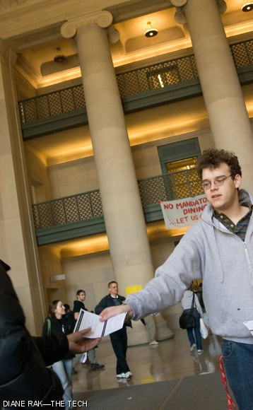 Andrew B. Shapiro ’11 passes out flyers during the Campaign for Students protest in Lobby 7 on Tuesday.