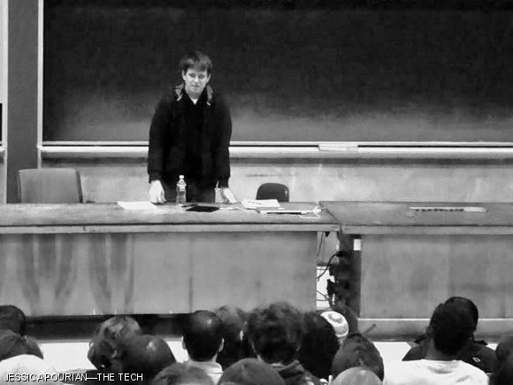 xkcd author Randall Munroe speaks to an audience in 26-100. The web comic artist visited on December 17 to answer questions and sign copies of his new book.