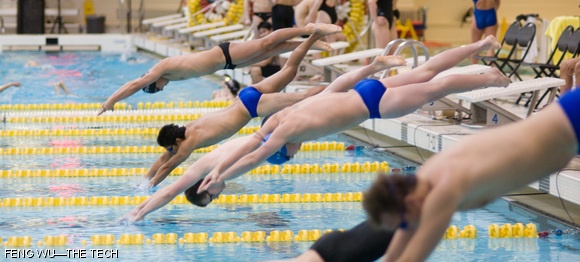 Swimmers leap into the water at the start of the men’s 200 meter breaststroke event during MIT’s home meet against Wheaton College on January 8, 2010 in the Zesiger Sports and Fitness Center. Nicholas A. Souza ’10 placed second in the event with a time of 2:26.80.