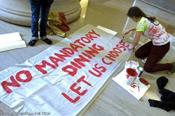 Carmel R. Dudley ’11 paints a banner reading “No Mandatory Dining / Let Us Choose!” that was hung in Lobby 7 during the Campaign For Students protest on Feb. 17. Students were protesting because of a leaked draft dining proposal from an MIT consultant that recommended mandatory meal plans.