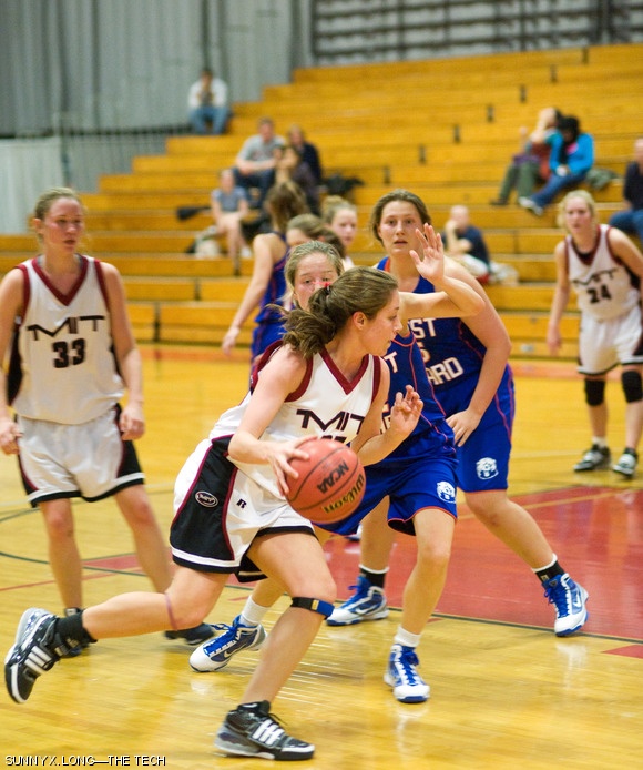 Erica N. Pino ’13 drives around a U.S. Coast Guard Academy defender in the first half of the women’s basketball game on December 2. The engineers were defeated 47-38.
