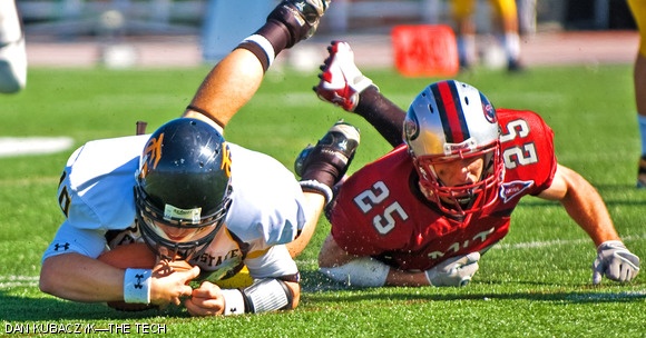 Defensive back Corey Garvey ’10 makes a key tackle in the Sept. 19 game against Framingham State at Steinbrenner Stadium.