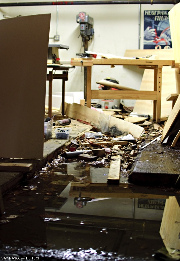 After a weekend of non-stop rain, large puddles and waterlogged debris have turned the machine shop at East Campus into a soggy mess. See article, page 13.