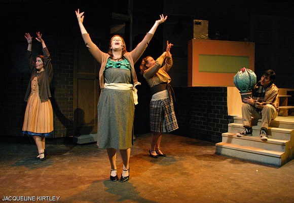 The hungry hungry plant: Three doo-wop girls (left to right: Emily A. Moberg ‘11, MartaLynne D. Milan ‘10, and Priscilla W. Army ‘10) sing “Ya Never Know” while Seymour (Jonathan A. Gray ’10) cradles his bloodthirsty plant in MTG’s production of Little Shop of Horrors. The show will also run on Friday and Saturday at 8 p.m. in La Sala de Puerto Rico. See the review, p. 6.