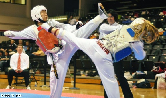 Erika Lee ’12 brings an axe kick down on Princeton University’s Rae Drach en route to a silver medal in the women’s black belt welterweight division. MIT’s Sport Taekwondo team captured its third consecutive national title on April 18 in Denver.