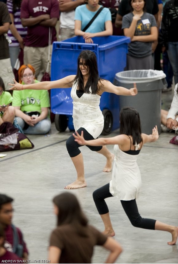 Akansha Kumar ’11 (left) and Shubhi Goyal ’12 perform with MIT Chamak, a South Asian fusion dance team, at the ASA Activities Midway last Friday. More than 200 student groups had booths in the Johnson Ice Rink.