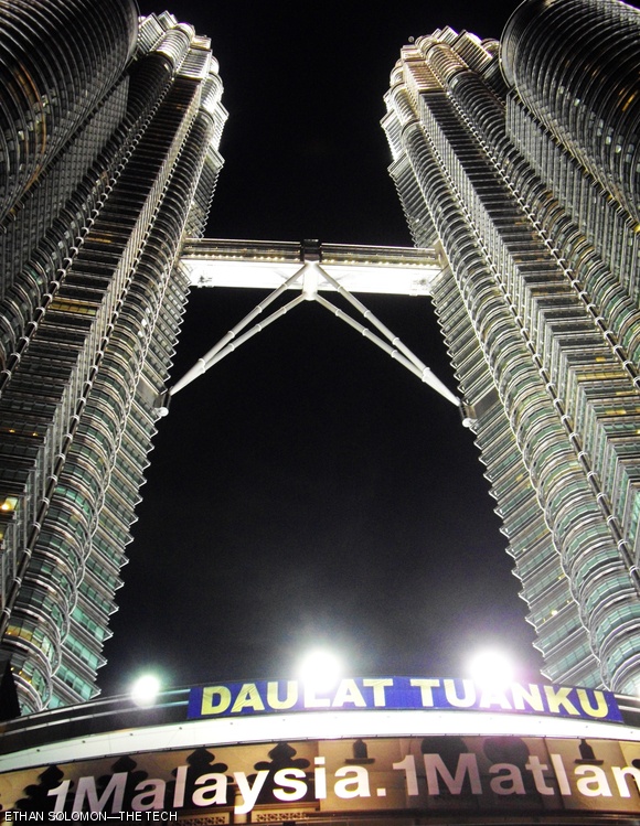 The Petronas Towers at night in Kuala Lumpur, Malaysia. The Petronas towers are the tallest twin buildings in the world, standing at 1482.6 feet.