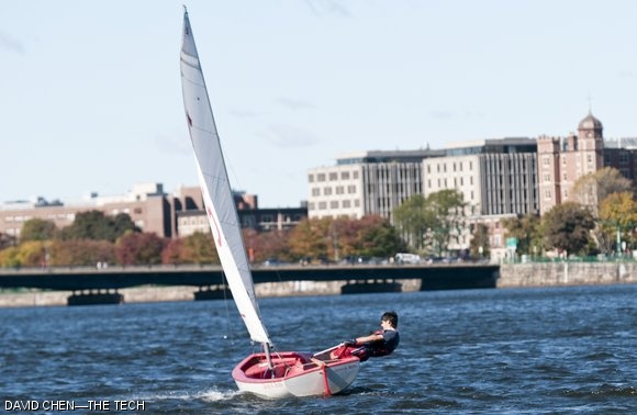 Neil T. Forrester ’12 steadies his boat during the 18th Annual Brass Rat Regatta on Saturday morning. Over 30 current and former members of MIT Sailing showed up for the race.