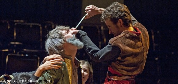 Cornwall (Adam Finelli) gouges out the eyes of the Earl of Gloucester (Joshua J.A. Walker ’12) after arresting him.
