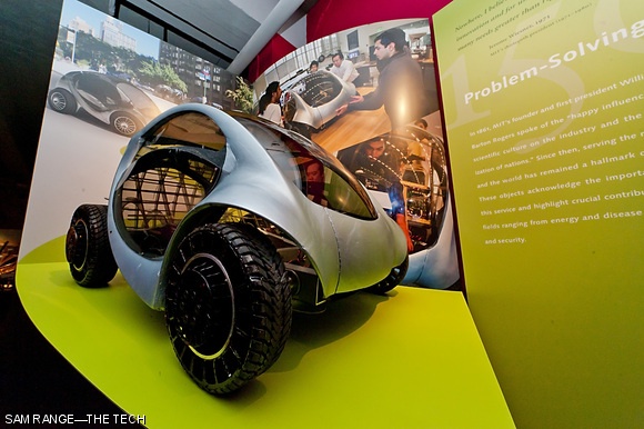A scale model of the MIT Media Lab’s CityCar is displayed at the MIT 150 exhibit at the MIT Museum.