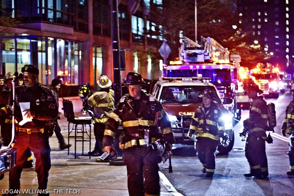 Firefighters respond to a chemical spill in the basements of buildings 66 and 68 Thursday. The small spill of acetonitrile caused no injuries, but caused the evacuation of buildings 66, 68, E17, E18, and E19 and closed Ames Street for several hours.
