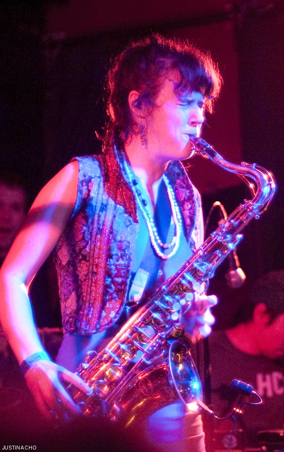 Kalmia Traver, Rubblebucket Orchestra’s lead vocalist, plays the tenor saxophone during the band’s concert at the Middle East this past Saturday.