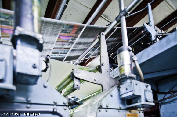Papers are printed on continuous rolls of newsprint, which are later cut and folded in order.
