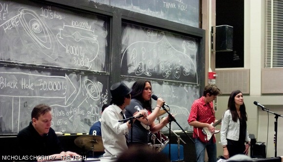Clara S. Bennett ’10 and the band Asymptotic Freedom rock out to Santana at the Physics Rock Concert held last Wednesday in 54-100. Band members included Prof. Martin W. Zwierlein PhD ’07 (piano), Prof. Enectalí Figueroa-Fliciano (drums), Meng Heng Touch ’12 (vocals), Prof. Alexander van Oudenaarden (guitar), Daniella C. Bardalez Gagliuffi ’11 (vocals), and Jeff R. Chabot PhD ’05 (guitar). Other acts featured popular songs re-imagined with physics- or physics department-related lyrics, including a cover of Simon and Garfunkel’s “Mrs. Robinson” that focused instead on Prof. Sean P. Robinson ’99, well-known to the crowd as the department administrator and head of Junior Lab.