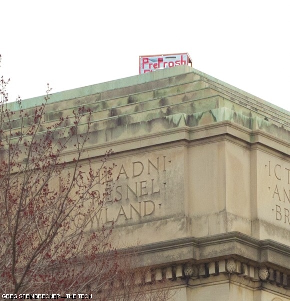 In conjunction with a flood of hacks, a desk appeared atop the pyramid on Building 1.