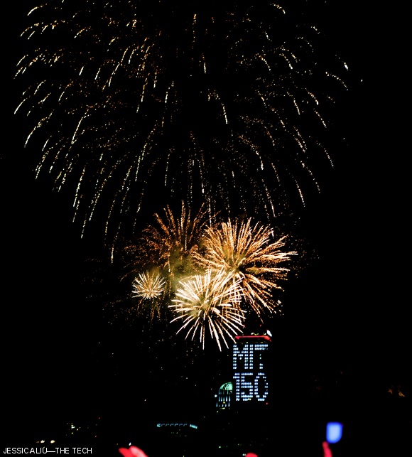 Fireworks light up the sky in front of the Prudential Center, MIT’s 750 feet high (134.32 Smoot) “birthday card.”