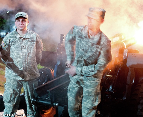 Members of the 101st Field Artillery Regiment fire off cannons during the 1812 Overture.