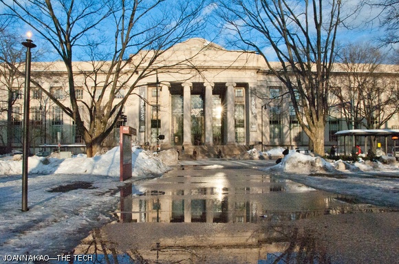 Even though we’re getting wet feet from stepping in the melted snow puddles, these puddles can be quite beautiful. Here’s a view of Lobby 7 and its reflection in a large clear puddle in front of the Student Center.