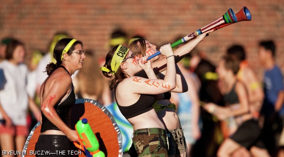 East Campus warriors blare their vuvuzelas during the annual East vs. West Water War on Kresge Oval yesterday evening. The water war is a time-honored Residence Exploration (REX) tradition.