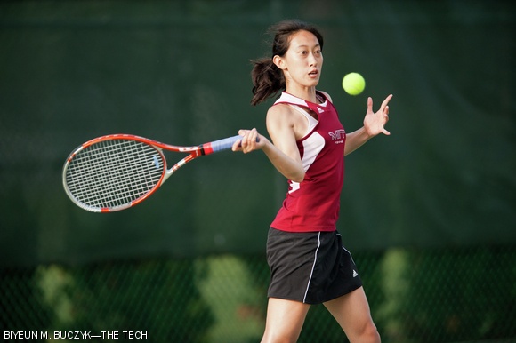 Julia C. Hsu ’14 volleys the ball back to Tufts in the No. 2 doubles on Tuesday. The Engineers lost the match 7-2.