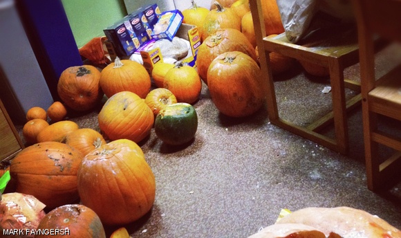 Pumpkins anticipate their fate along the 1W hallway at East Campus.