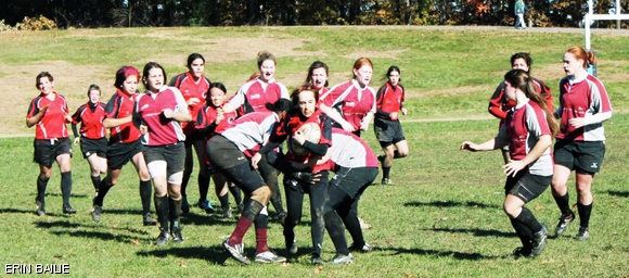Marisa B. Fryer ’15 attempts to run through WPI’s defensive line during last Saturday’s New England Women’s Collegiate Rubgy Conference game against WPI. The Engineers entered the NEWCRC playoffs last week as the fifth seed and played through the snow to defeat Babson, leading them to Saturday’s 24-17 win over WPI.